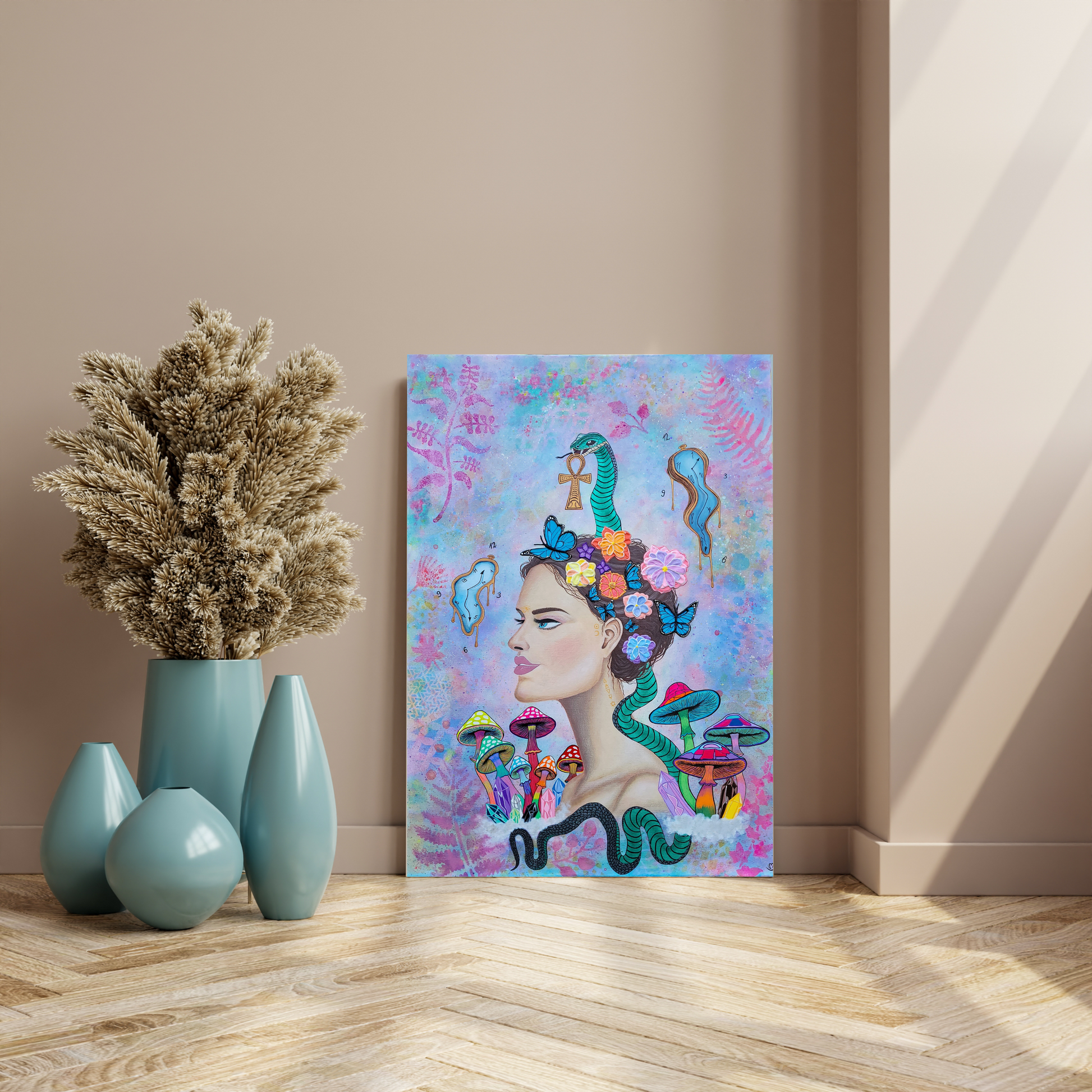 Visionary artwork leaning against cappuccino-colored wall, next to blue vases and pampas grass, soft neutral tones and natural wood flooring